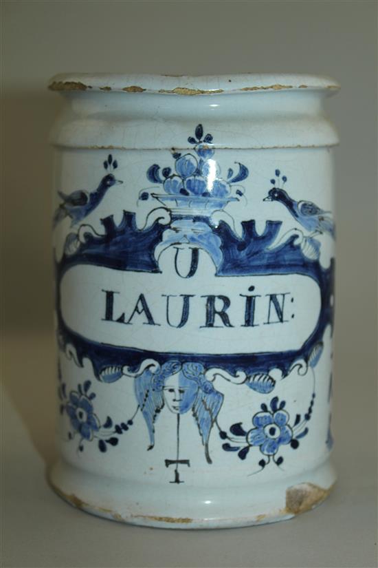 A Delft blue and white cylindrical wet drug jar, early 18th century, 15.5cm, some damage